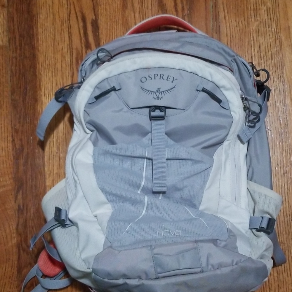 Gray and coral Osprey backpack